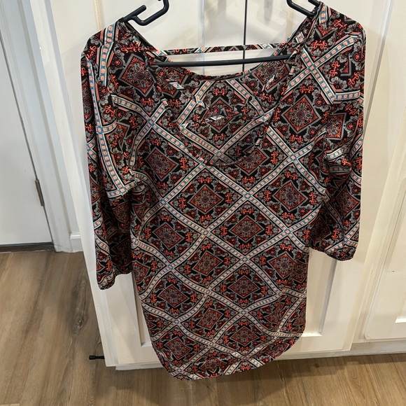 Women’s size small. Higher in the front, lower in the back. - Picture 2 of 4